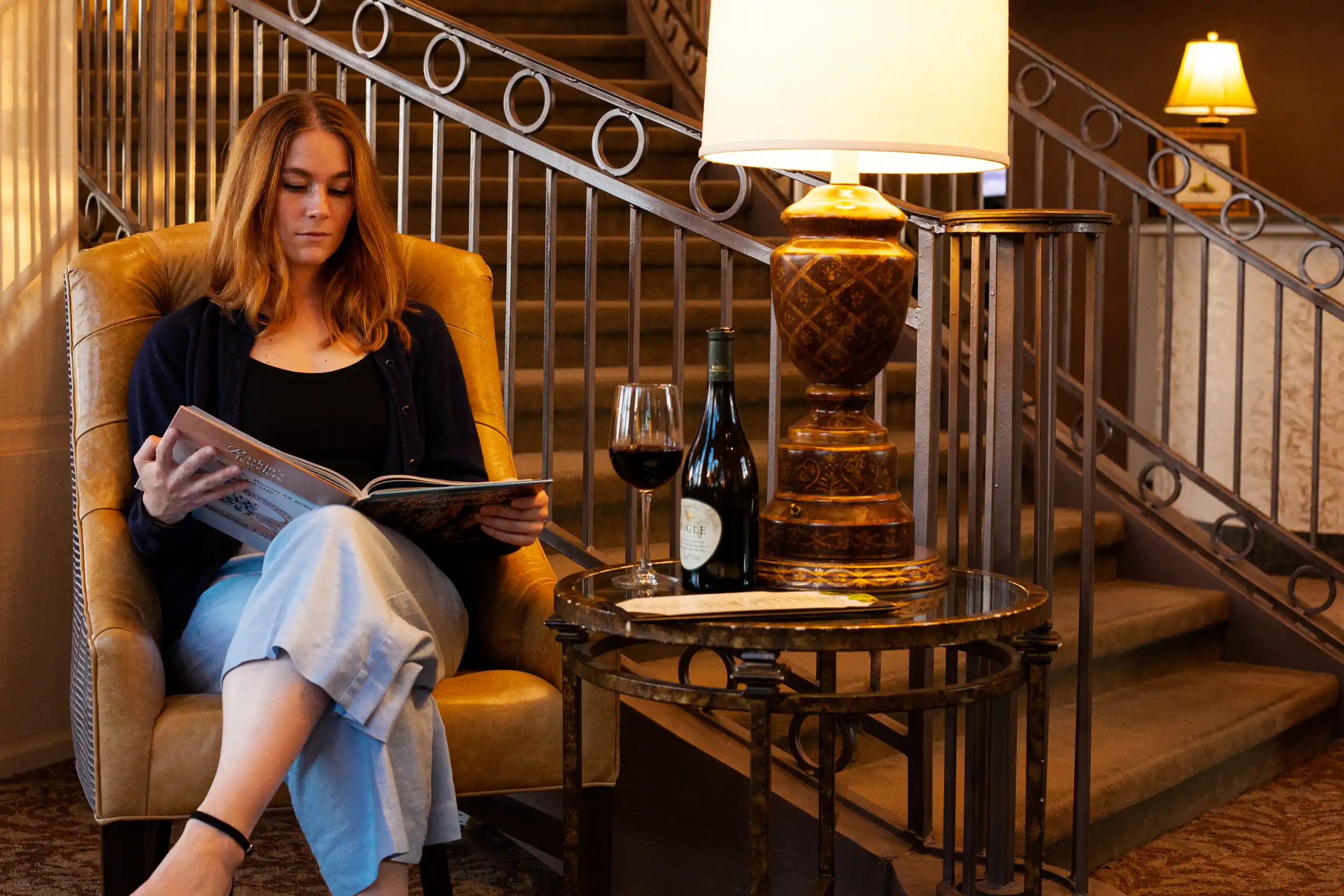 Woman reading at Luxury Hotel in Prescott