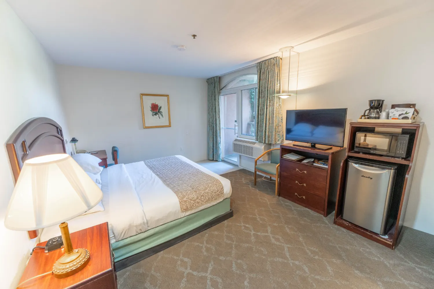 Standard King Accessible Room with Balcony and Amenities Standard King Accessible room with king bed, TV, mini fridge, and balcony in Prescott hotel
