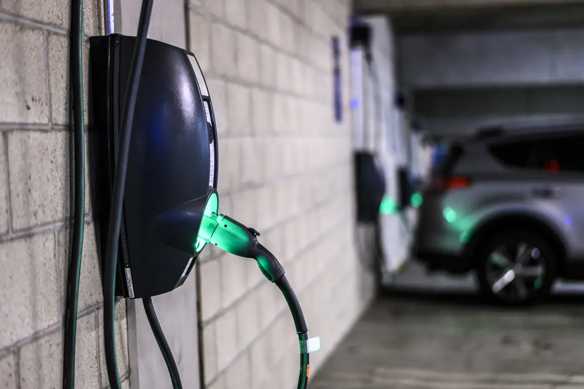 Power supply box at an electric vehicle charging station in a parking garage, representing hotel with EV charging options for Prescott travelers.